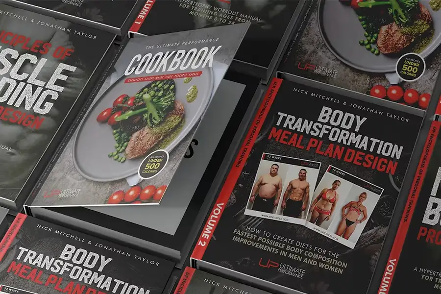 Books on fitness and nutrition, including 'The Ultimate Performance Cookbook' showing a healthy meal, and 'Body Transformation Meal Plan Design' with before and after transformation photos.