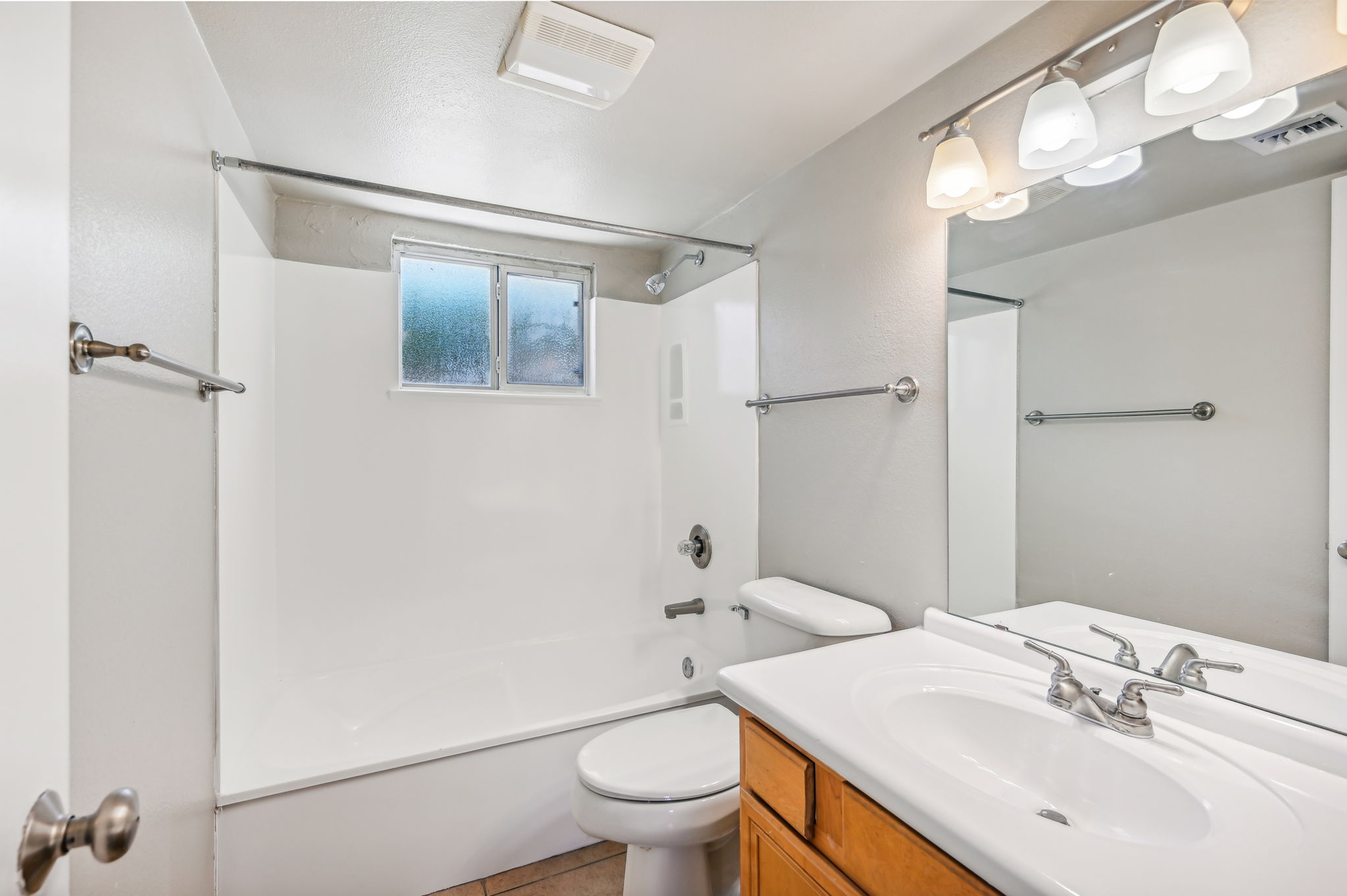 Bathroom with toilet shower and vanity