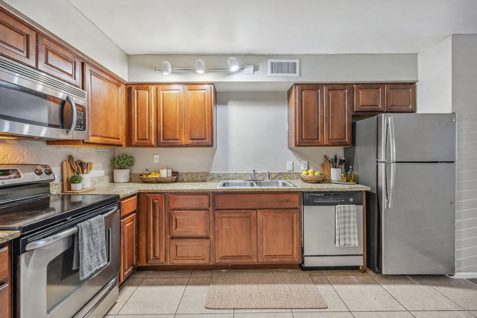Kitchen with brown cabinets