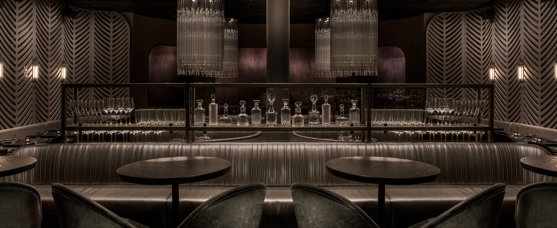 A moody photo of BLVD Chicago's lower level bar