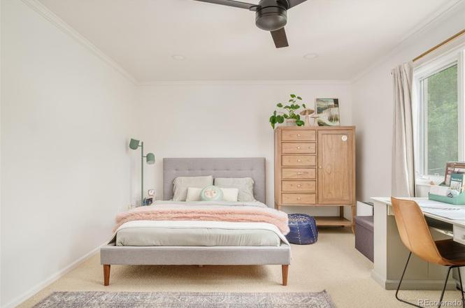 Bright bedroom renovation showcasing clean design, natural light, and contemporary furnishings.