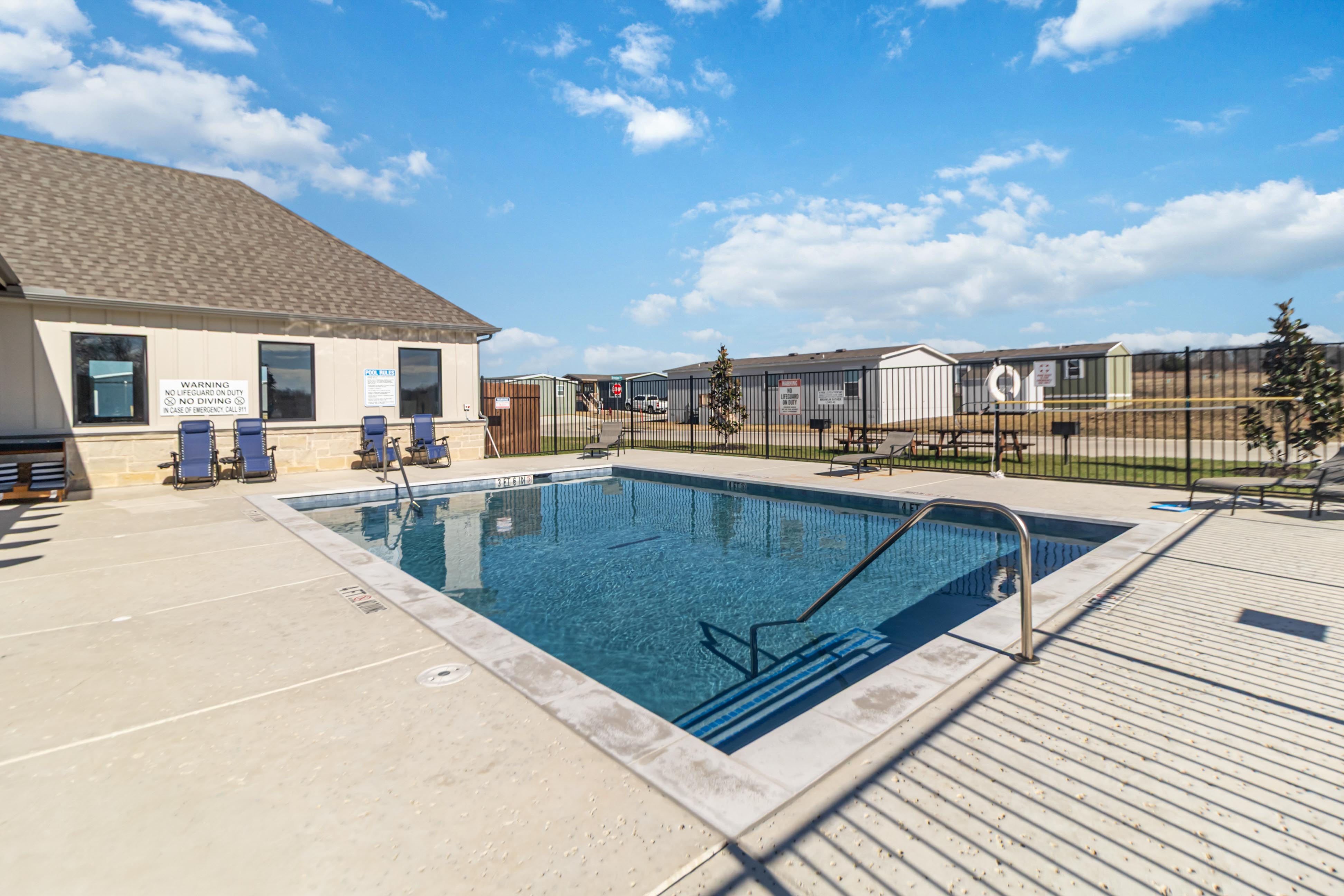 Swimming pool located at clubhouse.