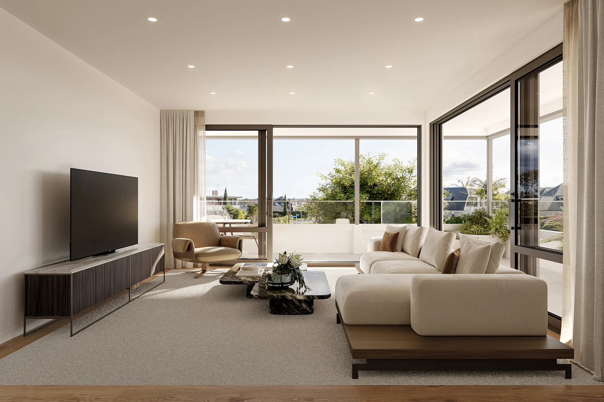 Media room with beige sectional sofa, olive armchair, dark wood TV console, black coffee table, and large sliding glass doors opening to a balcony.