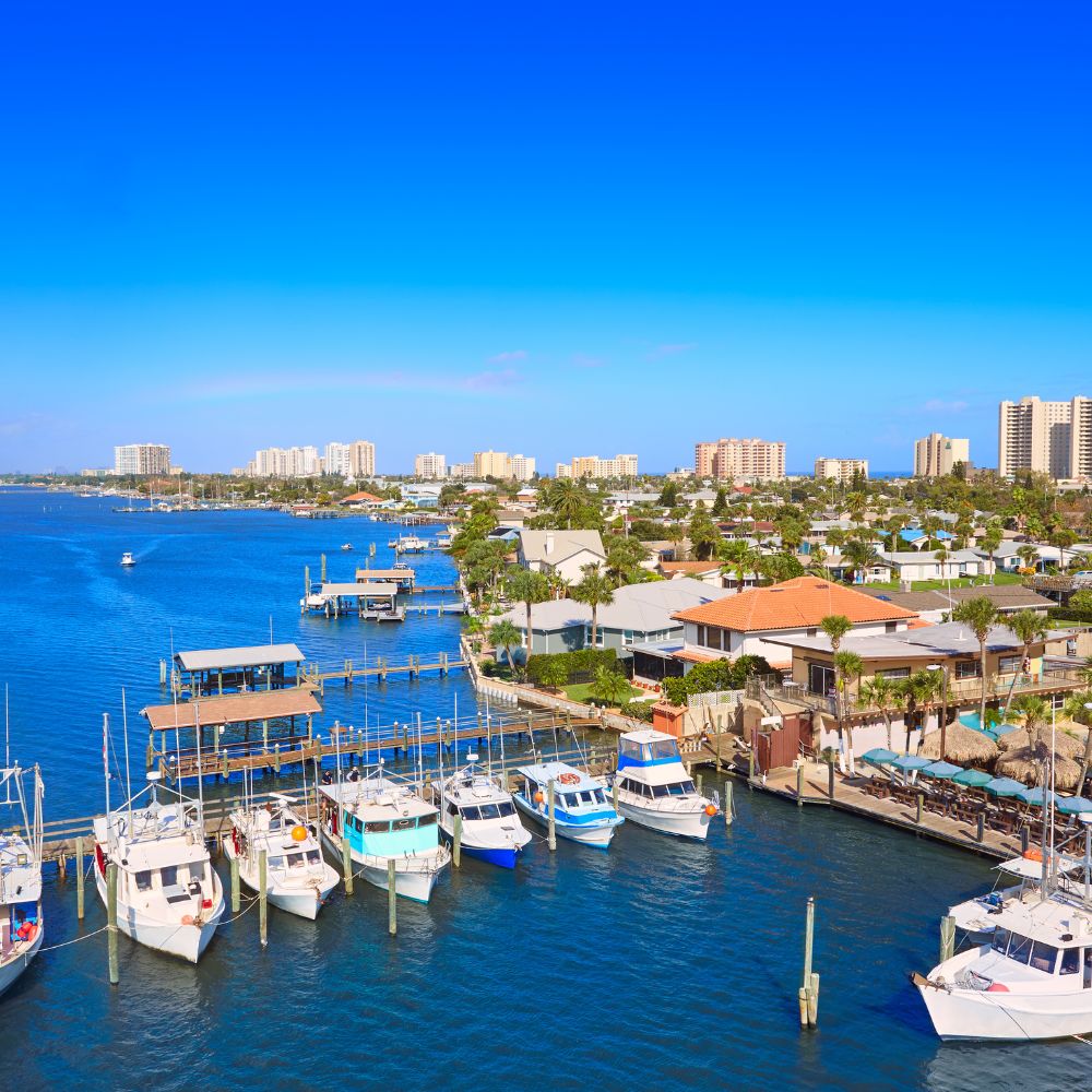 Marina with moored boats and waterfront homes along the Intracoastal in Port Orange, Florida