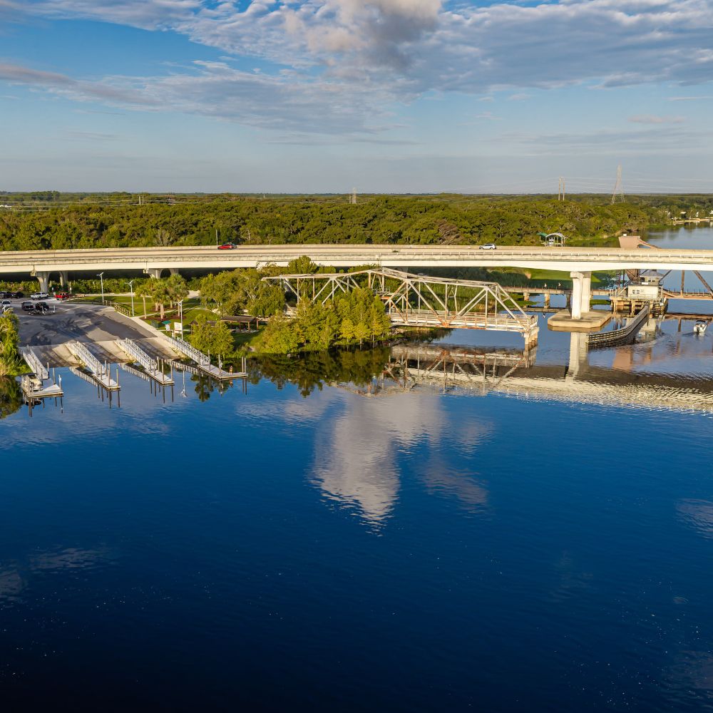 Bridge and boat ramp over a calm river in Sanford, Florida