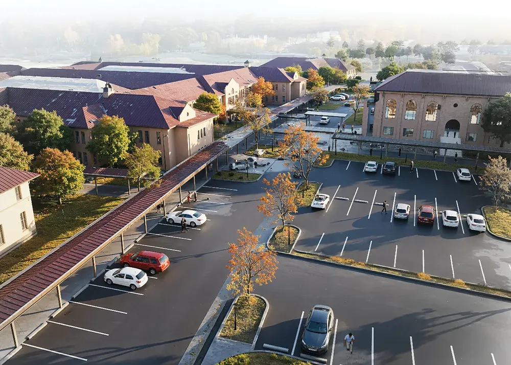 rendering showing parking and buildings in a future for the swift center
