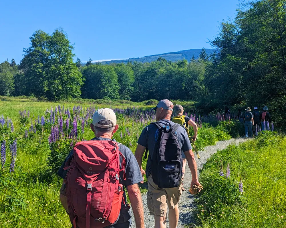 People walking on trails at the Swift Center. Photo courtesy of Skagit Trail Builders.
