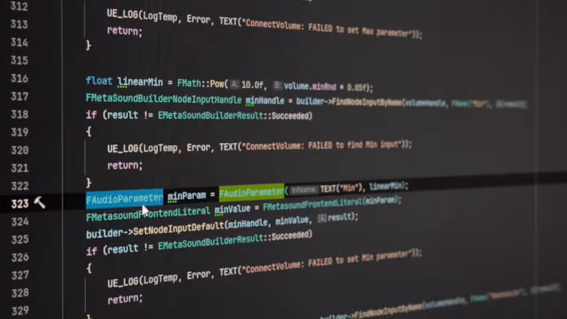 Close-up of computer screen displaying C++ code for setting audio volume parameters.