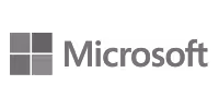 Microsoft logo with four square panes forming a window beside the company name.