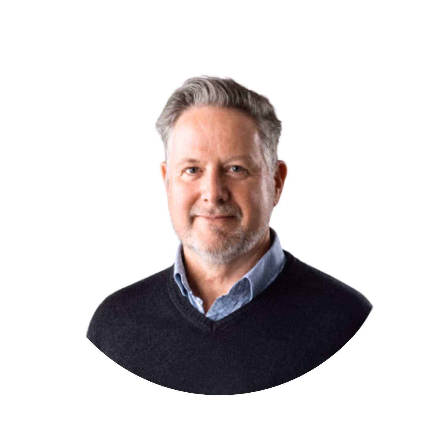 Middle-aged man with gray hair and beard wearing a black sweater and blue shirt, smiling slightly.
