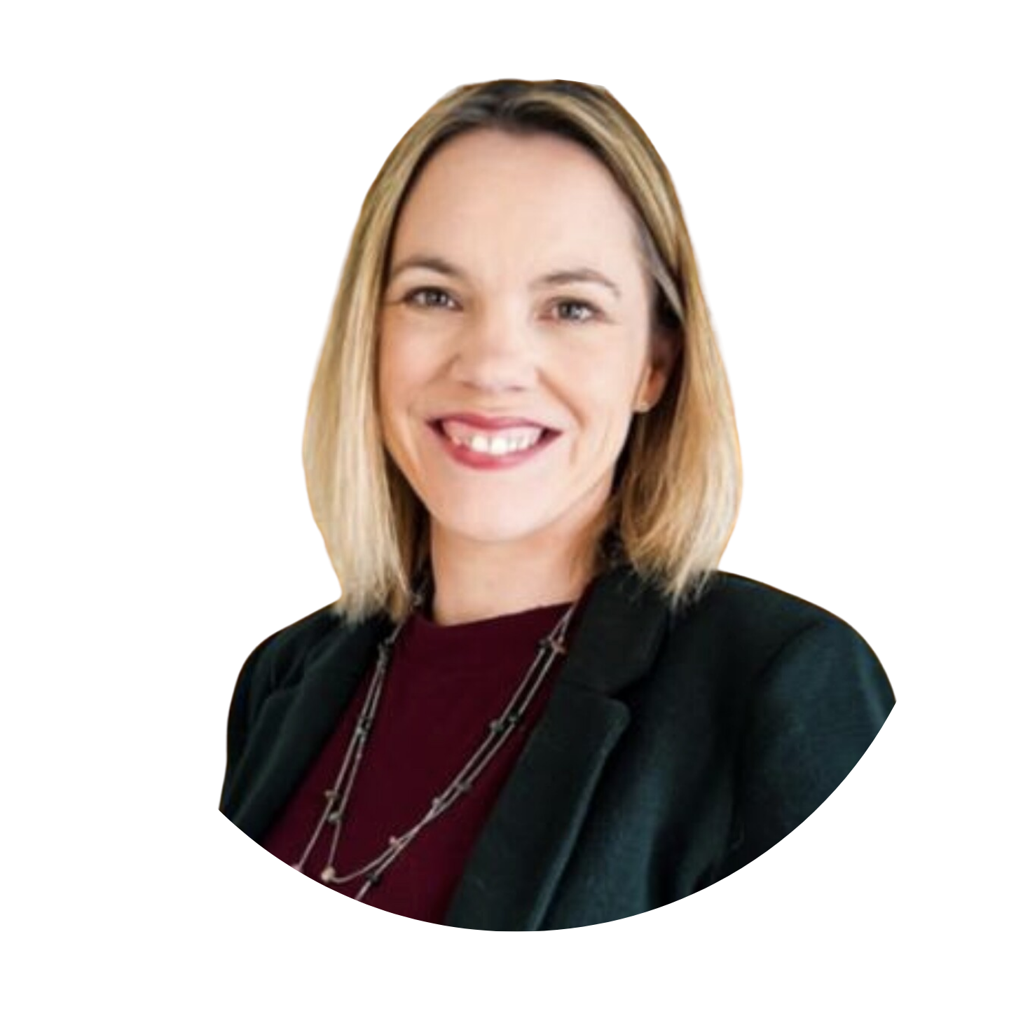 Smiling woman with blonde hair wearing a black blazer and layered necklace.