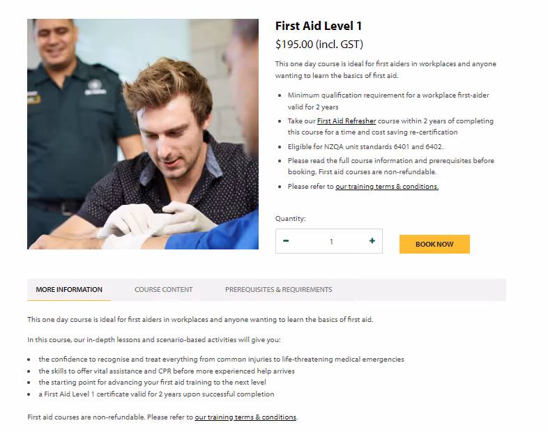 An instructor guiding a participant during a hands-on first aid training session, showcasing engagement between instructor and learner.