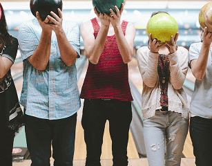 Image of 4 children holding a ball