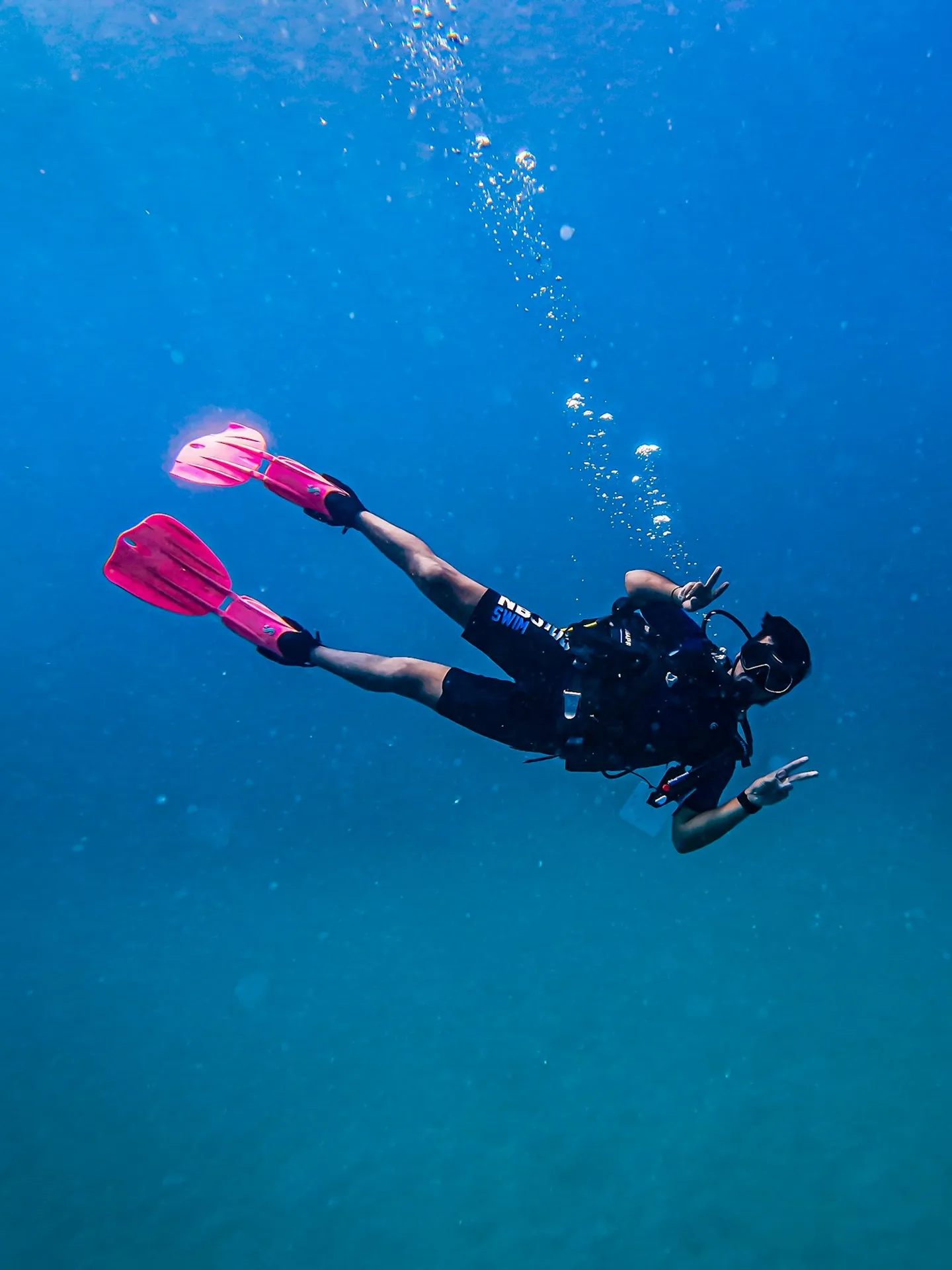 a-diver-explores-the-deep-blue-ocean