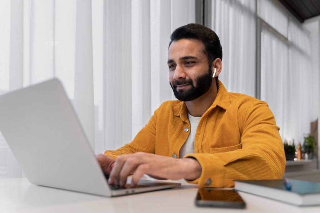 man wearing yellow jacket - Best Forex Trading Apps for Beginners