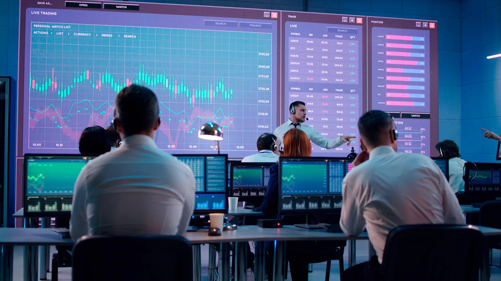 people looking at a trading chart - Can Day Trading Be A Career