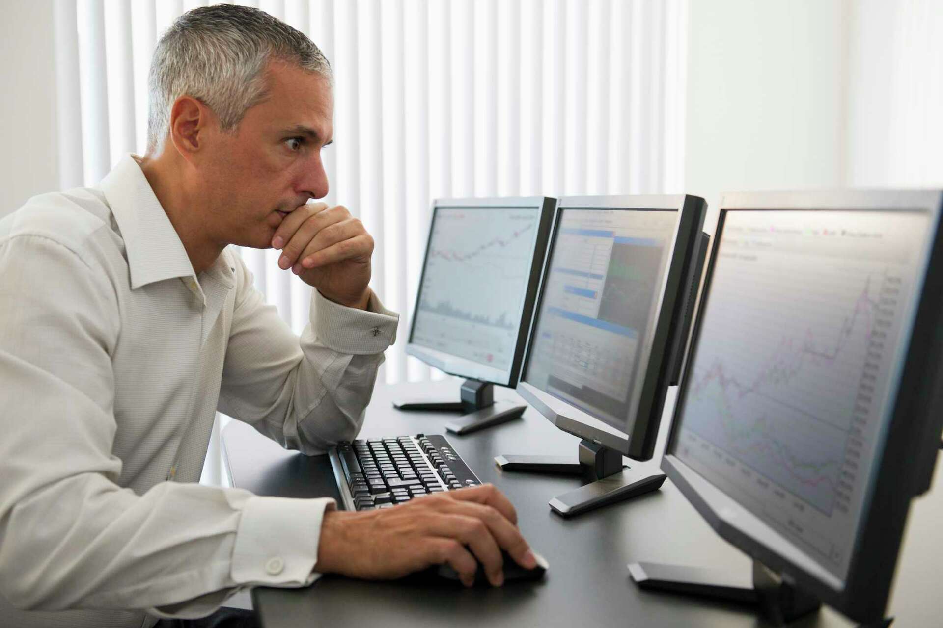 a trader thinking - Is Day Trading A Good Side Hustle