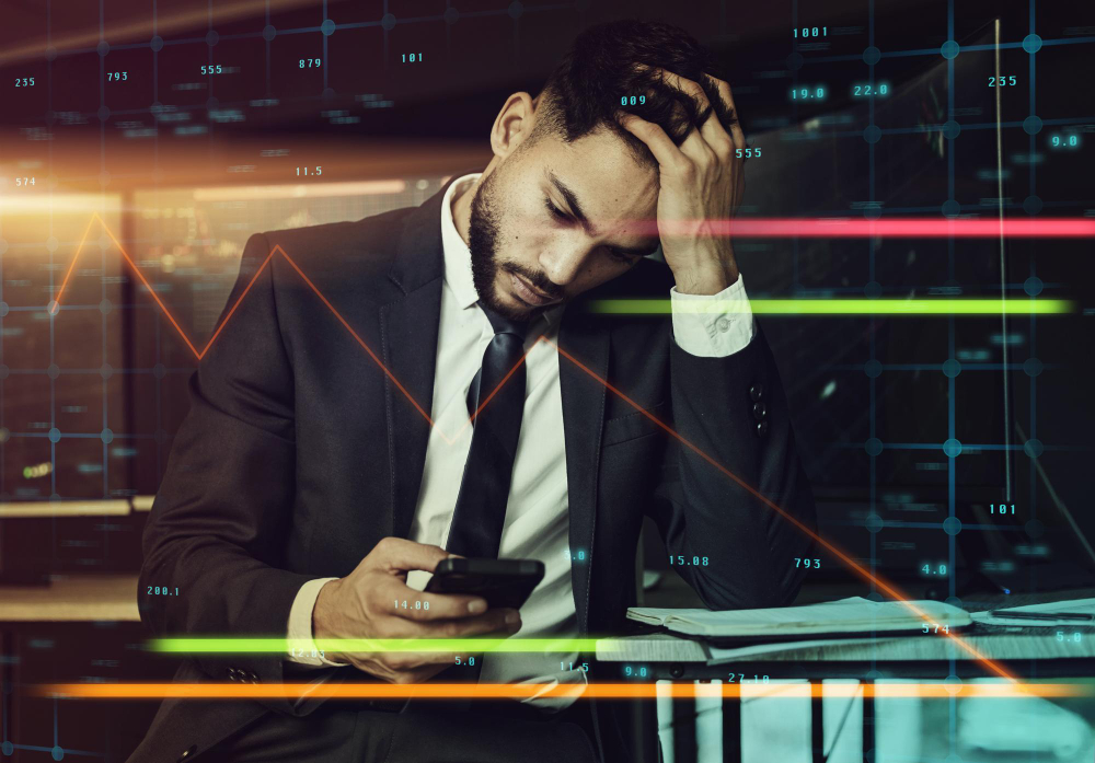 man looking sad - What Challenges Do Traders Face