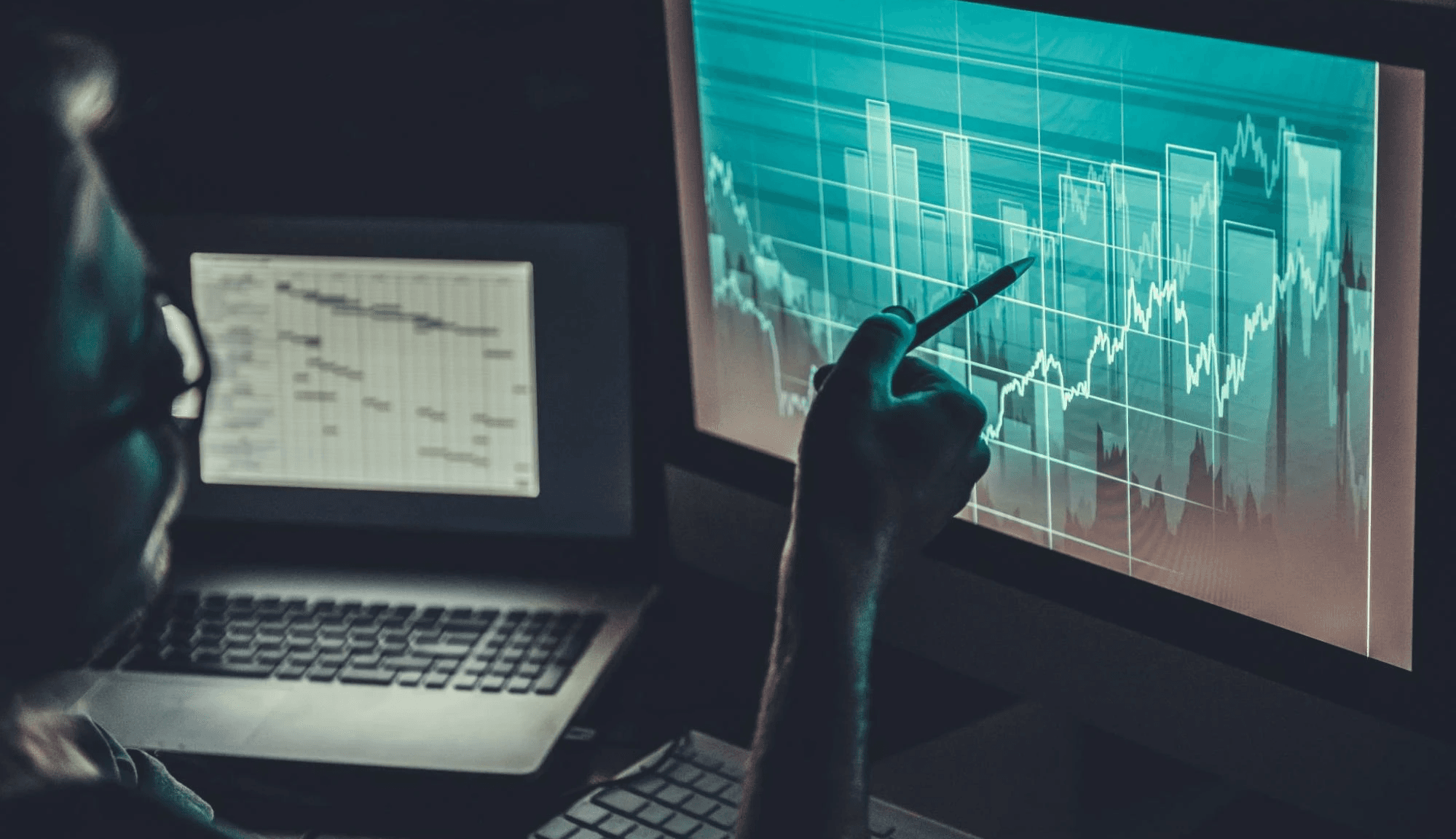 Person analyzing monitor - Spot Algorithmic Trading
