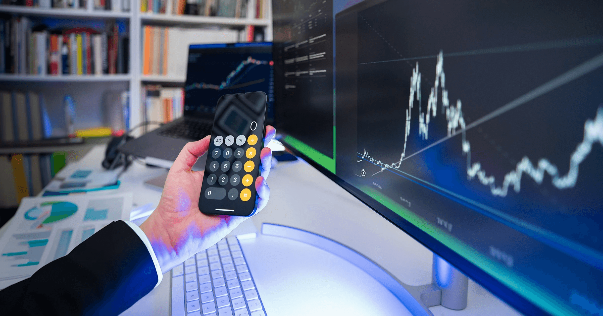 Person calculating while analyzing financial charts - Forex Trading Profit Per Day