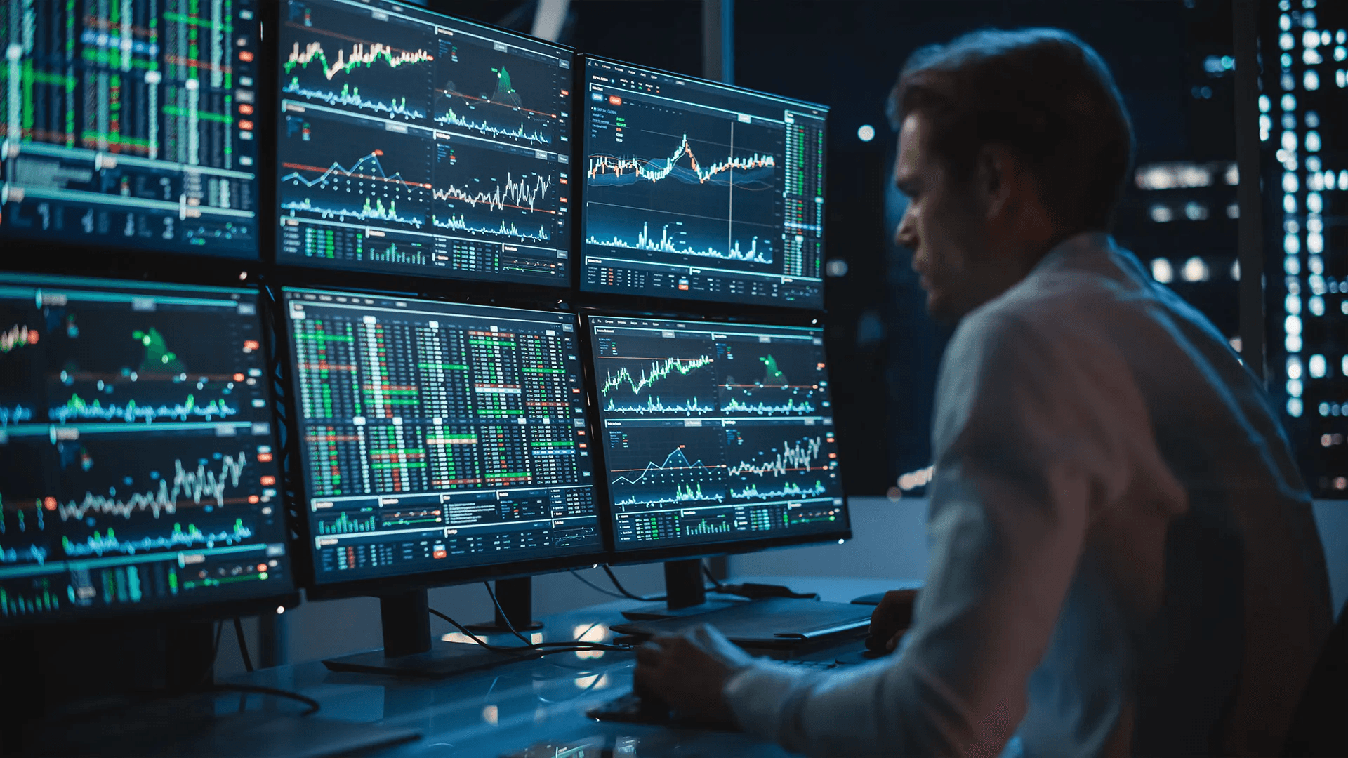 Man analyzing financial market data charts - Best Charting Software for Day Trading