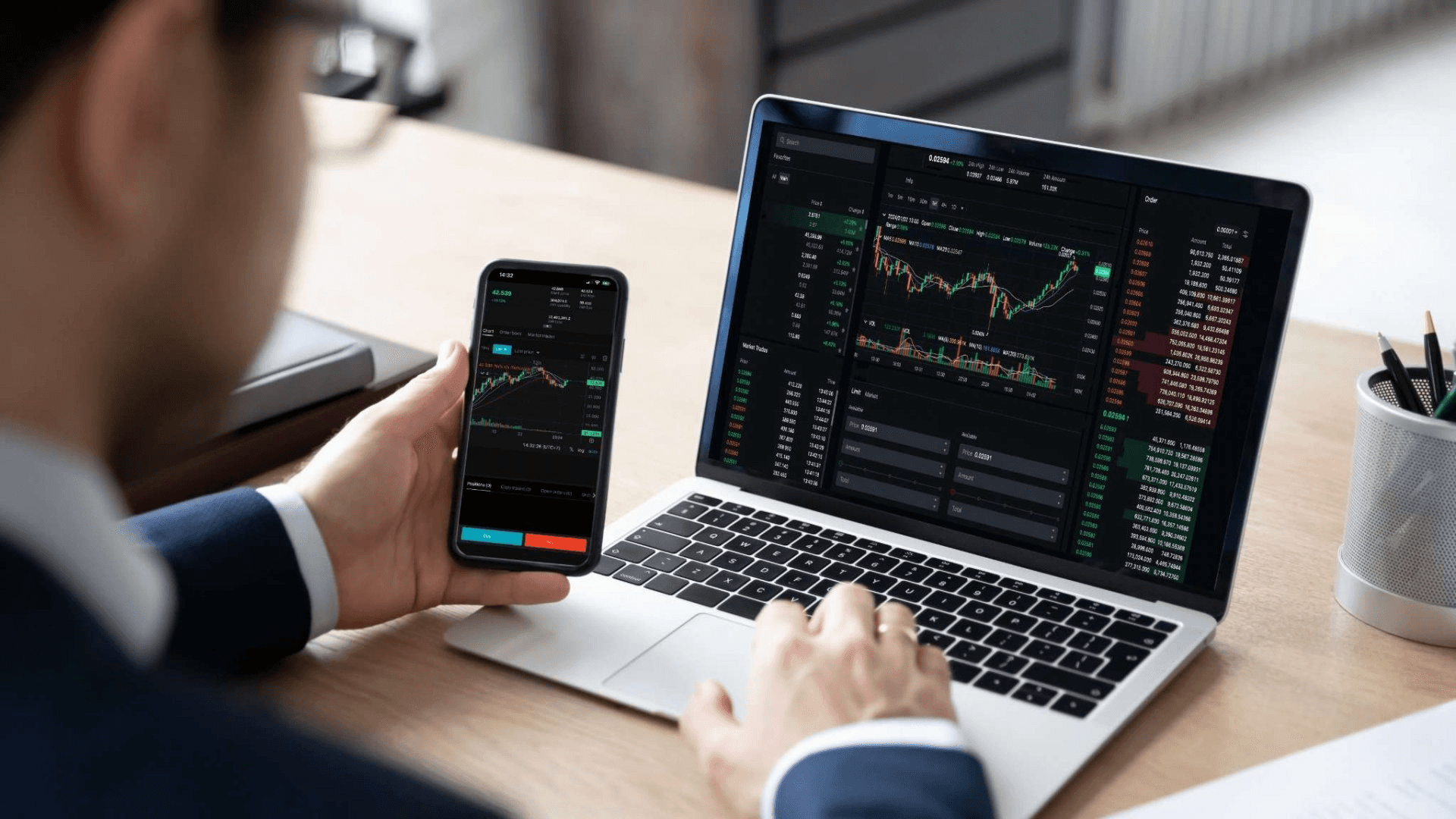 Trader analyzing market data on devices - Best Funded Accounts UK