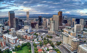 Aerial view of downtown Denver with skyscrapers and residential buildings, highlighting Colorado’s urban healthcare and medical staffing market.