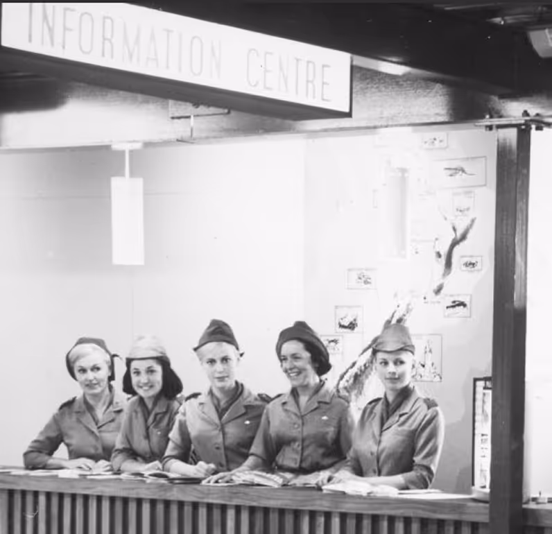 Auckland Airport information desk 1966 - Source: Auckland Libraries Heritage Collections 02763 Trevor Penman Courtesy of Stuff Ltd