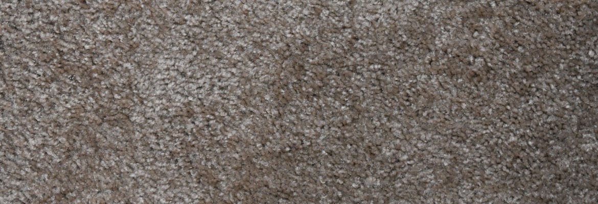 Texture de tapis à poils longs gris et beige.
