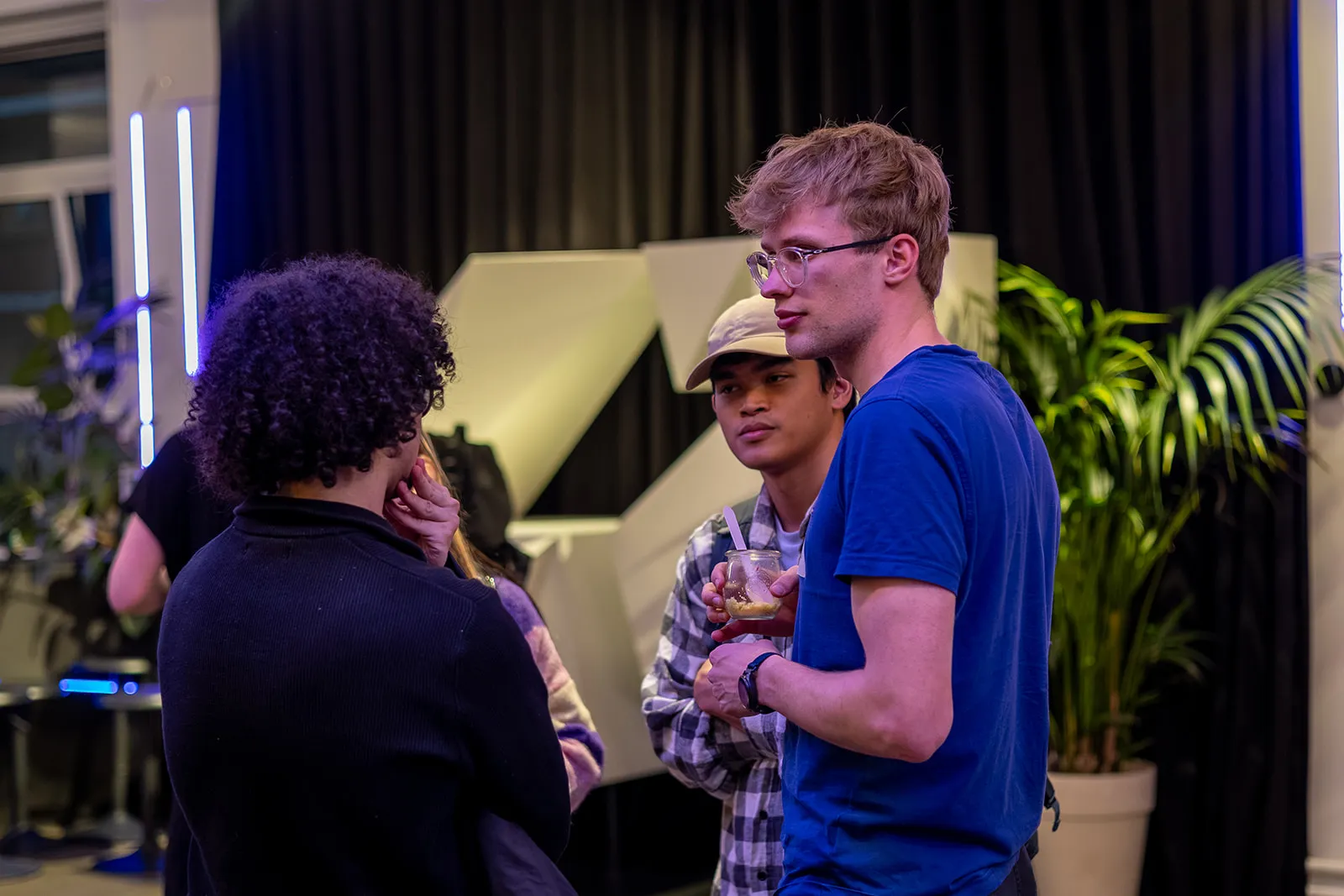 Attendees engaged in conversation