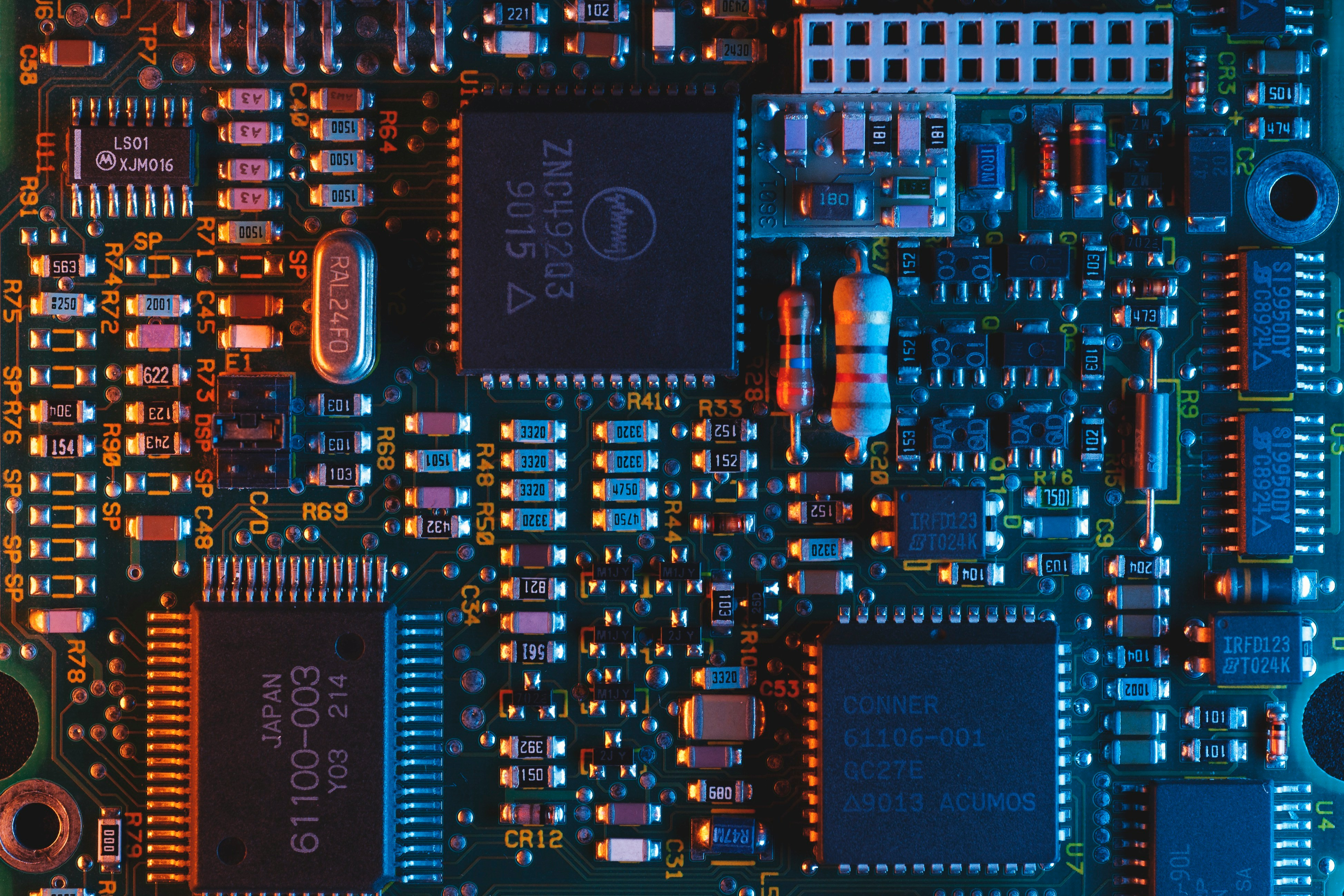 Macro photo of an electronic circuit board with chips and components