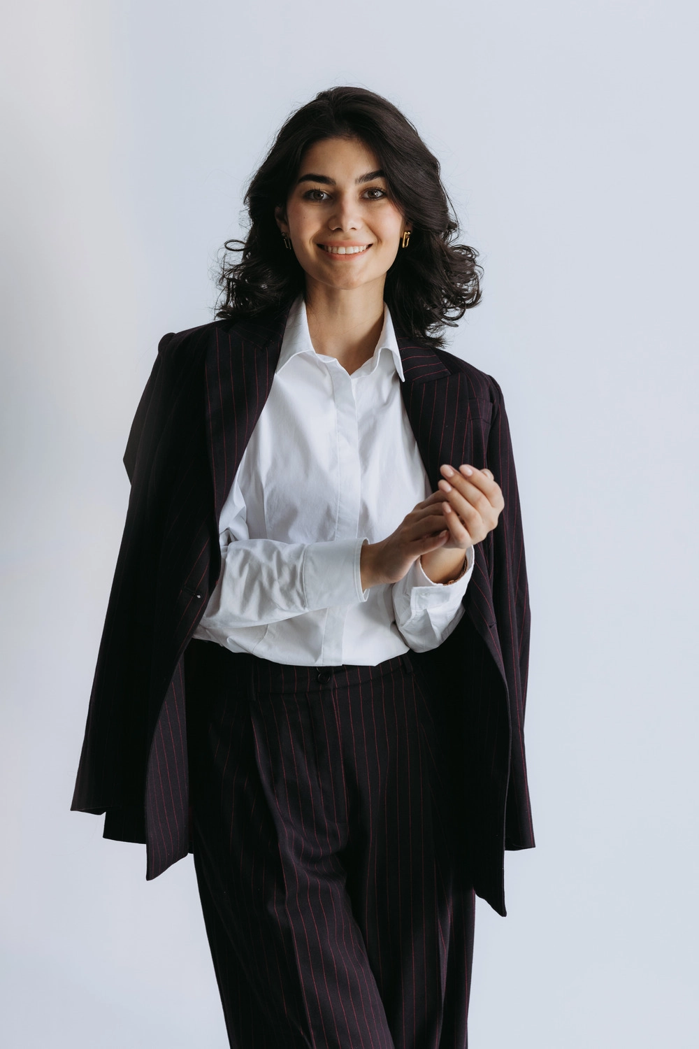 Diana Kurbanova speaking at a startup conference in Central Asia — delivering keynote on franchising models and women-led venture growth.