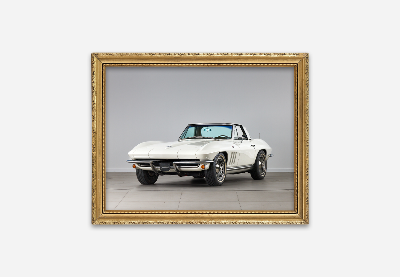 Gold antique frame with corvette car