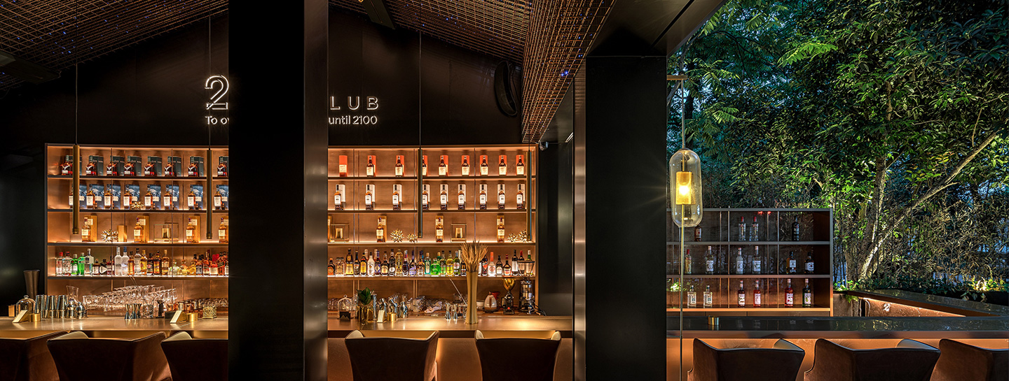 brown wooden chairs in top glass