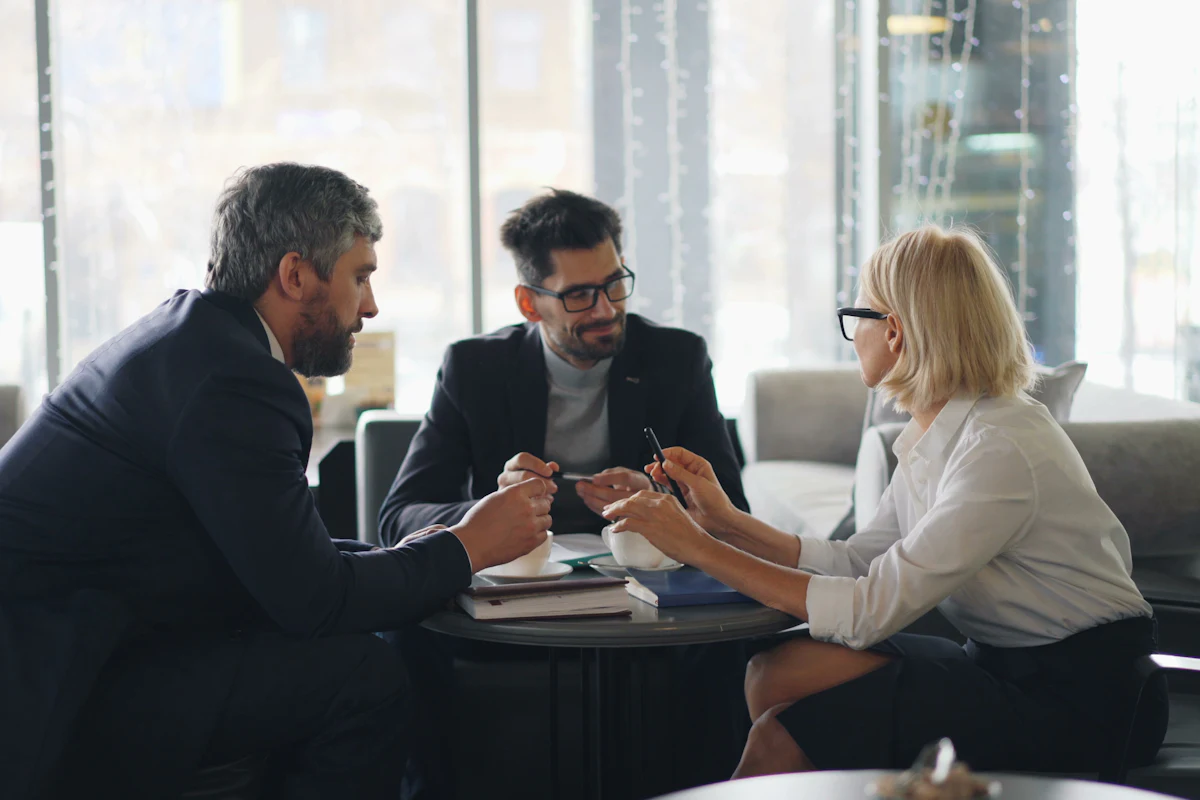 Advisors meeting with a client around a table