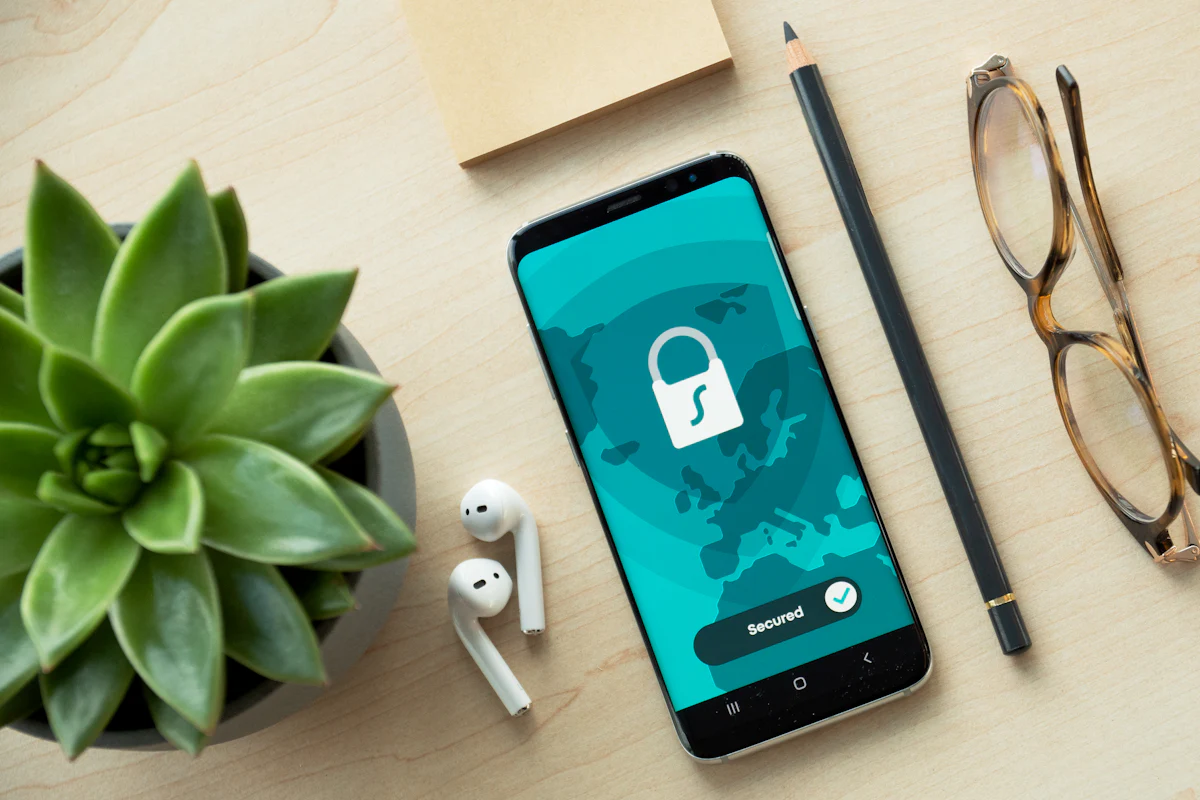 Smartphone showing a secured lock screen on a desk
