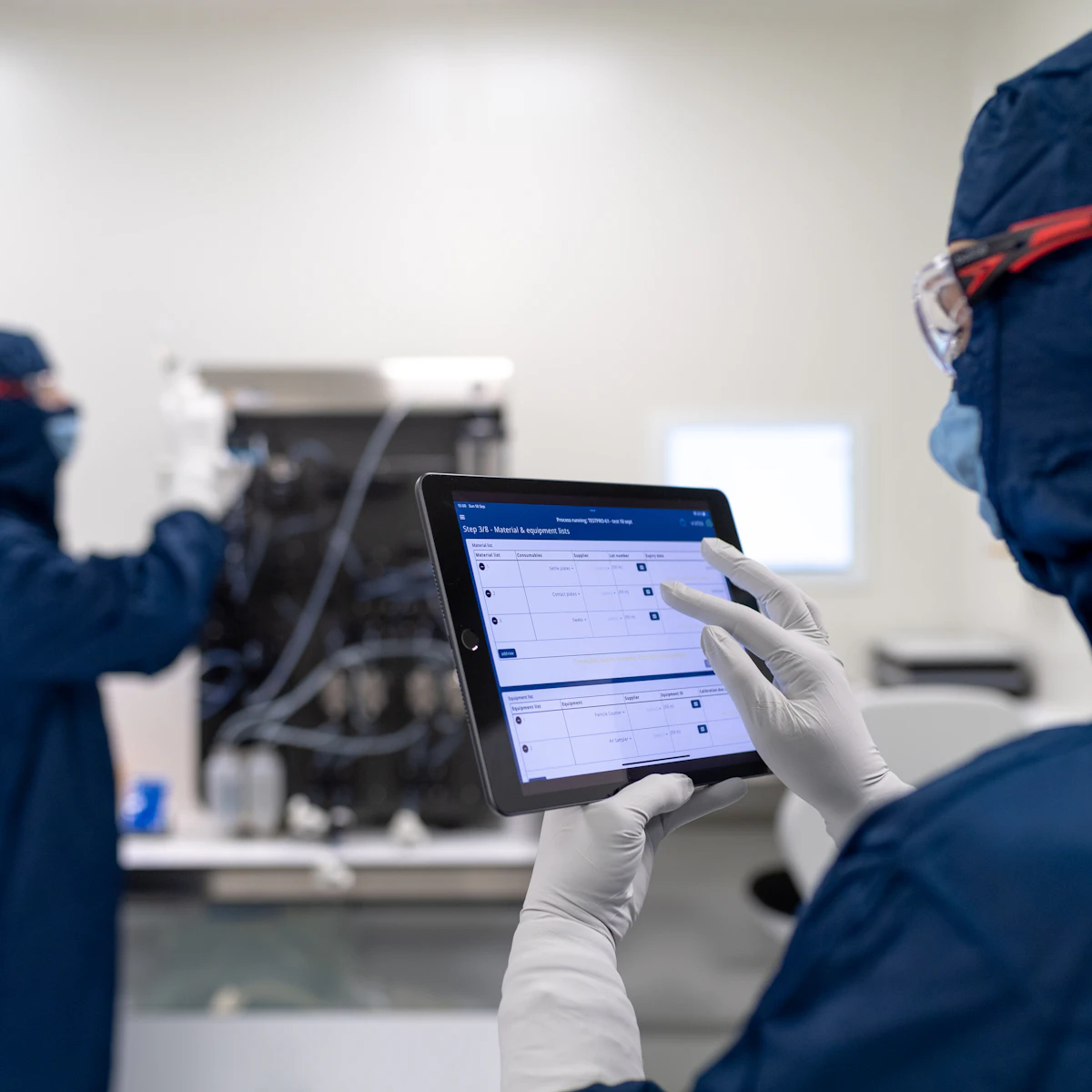 Manufacturing worker using a tablet on the production floor
