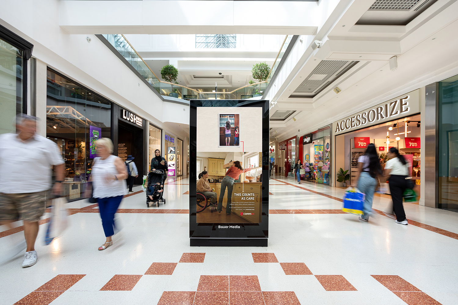 Carers UK DOOH advert in a shopping mall