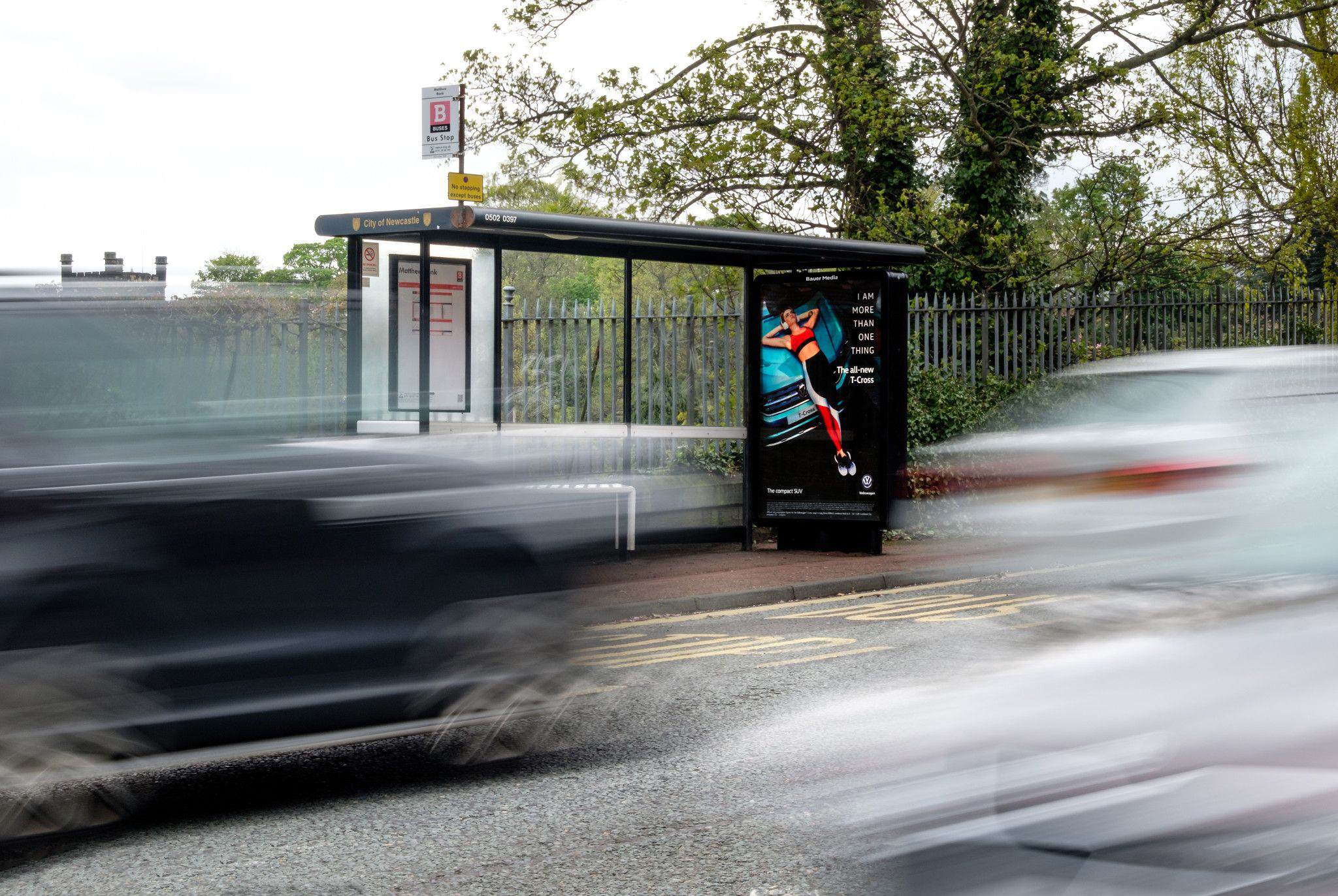 A VW ad campaign on a bus stop poster