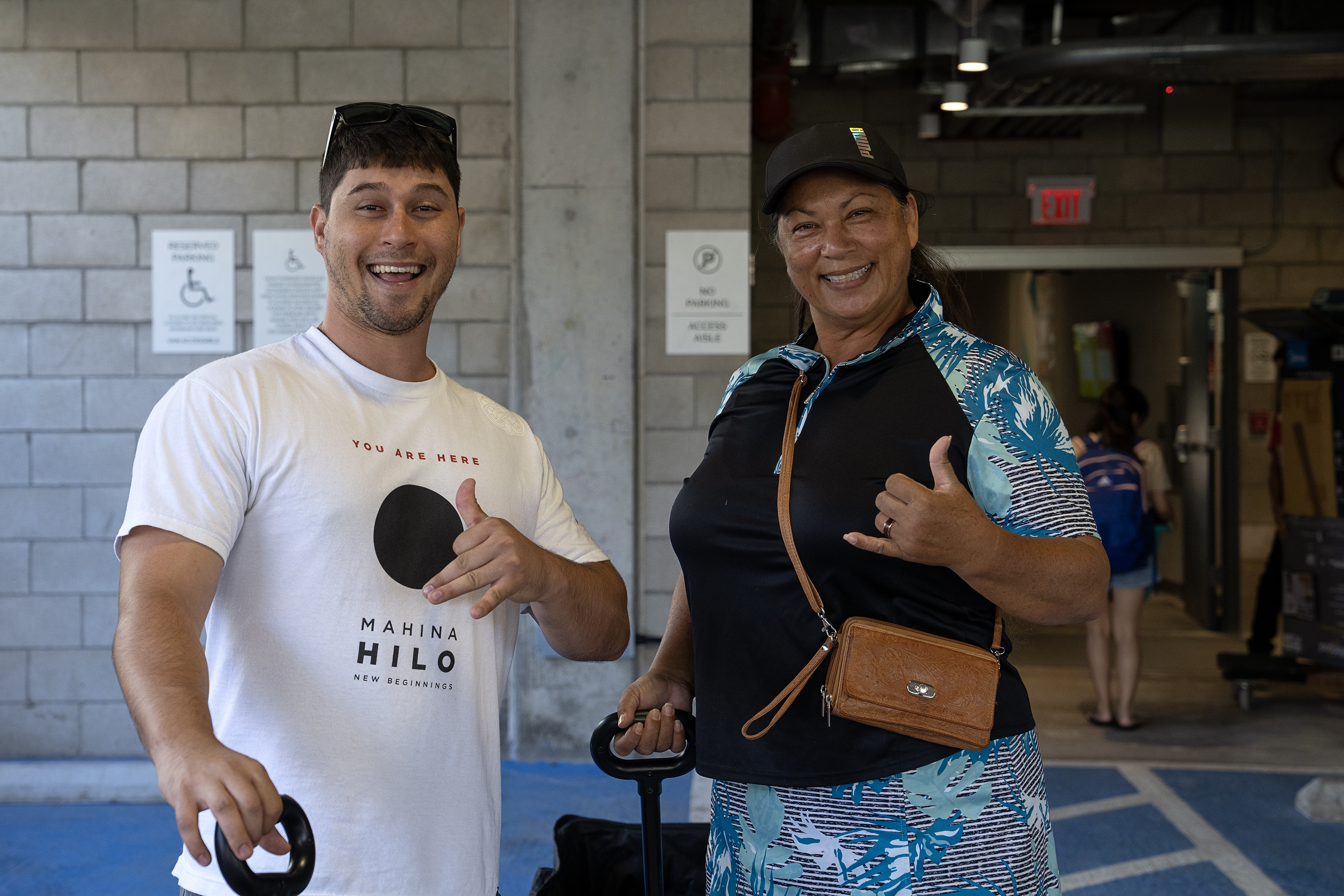 Students posing with shaka sign