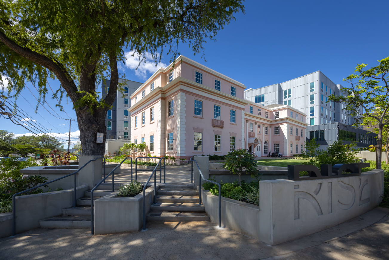 RISE exterior with staircase and RISE mural
