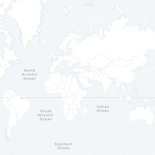 Mapa mundial en vista de proyección que muestra continentes y océanos etiquetados, incluyendo Océano Atlántico Norte, Océano Atlántico Sur, Océano Índico y Océano Austral.
