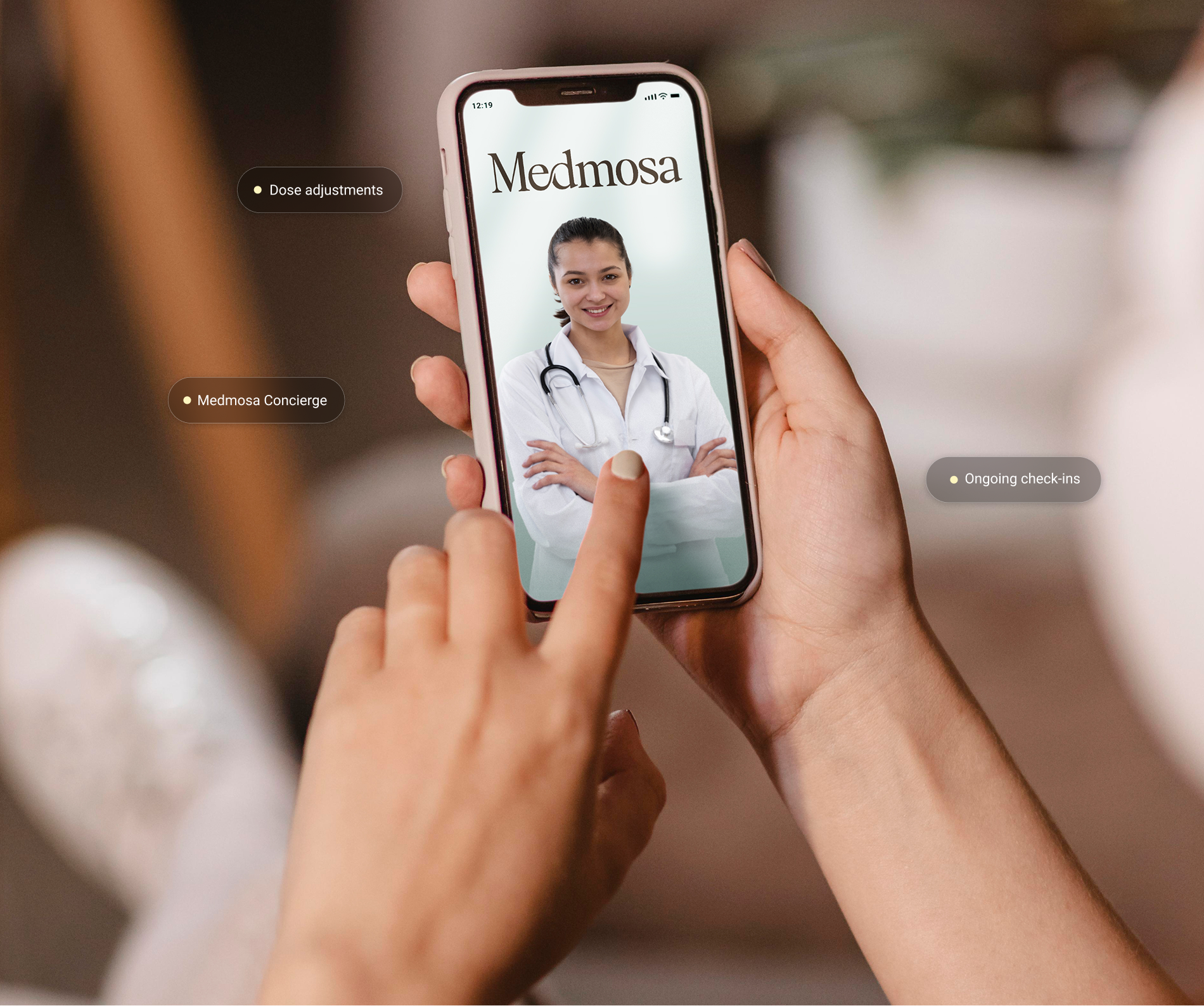 Person holding smartphone showing Medmosa app screen with a female doctor and features like dose adjustments, Medmosa Concierge, and ongoing check-ins.