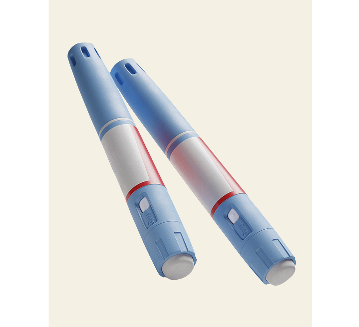 Two blue and white insulin pens angled diagonally on a light background.