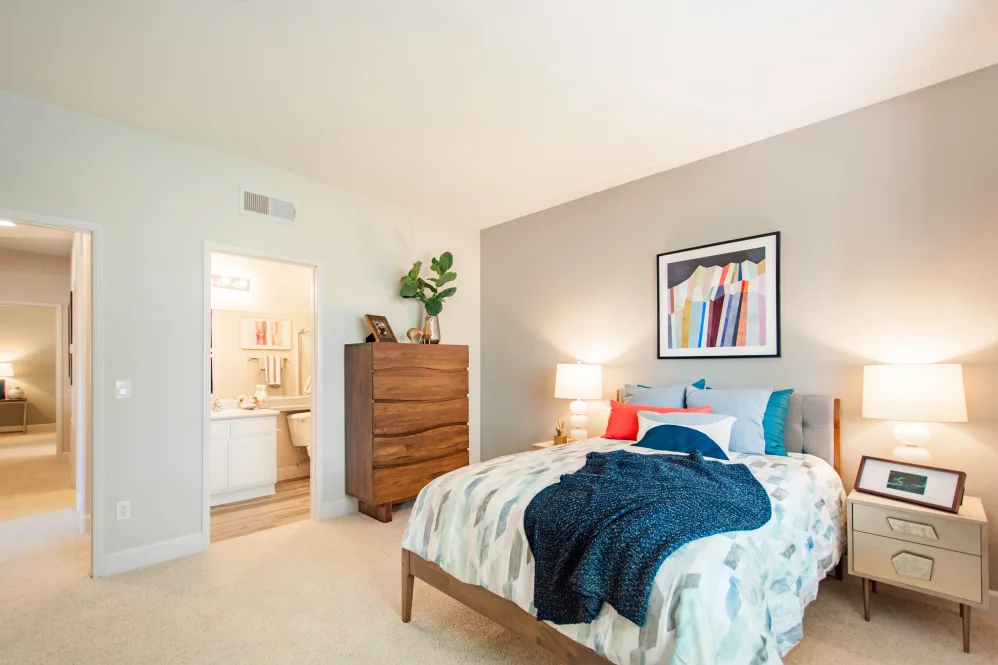 bedroom with view of hallway and bathroom