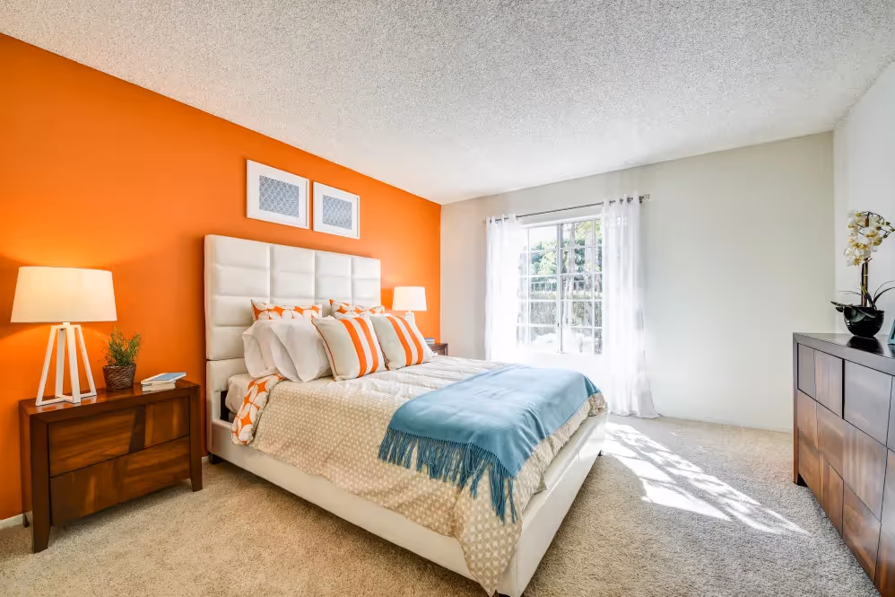 Furnished Bedroom with bed, wardrobe, and with a large window