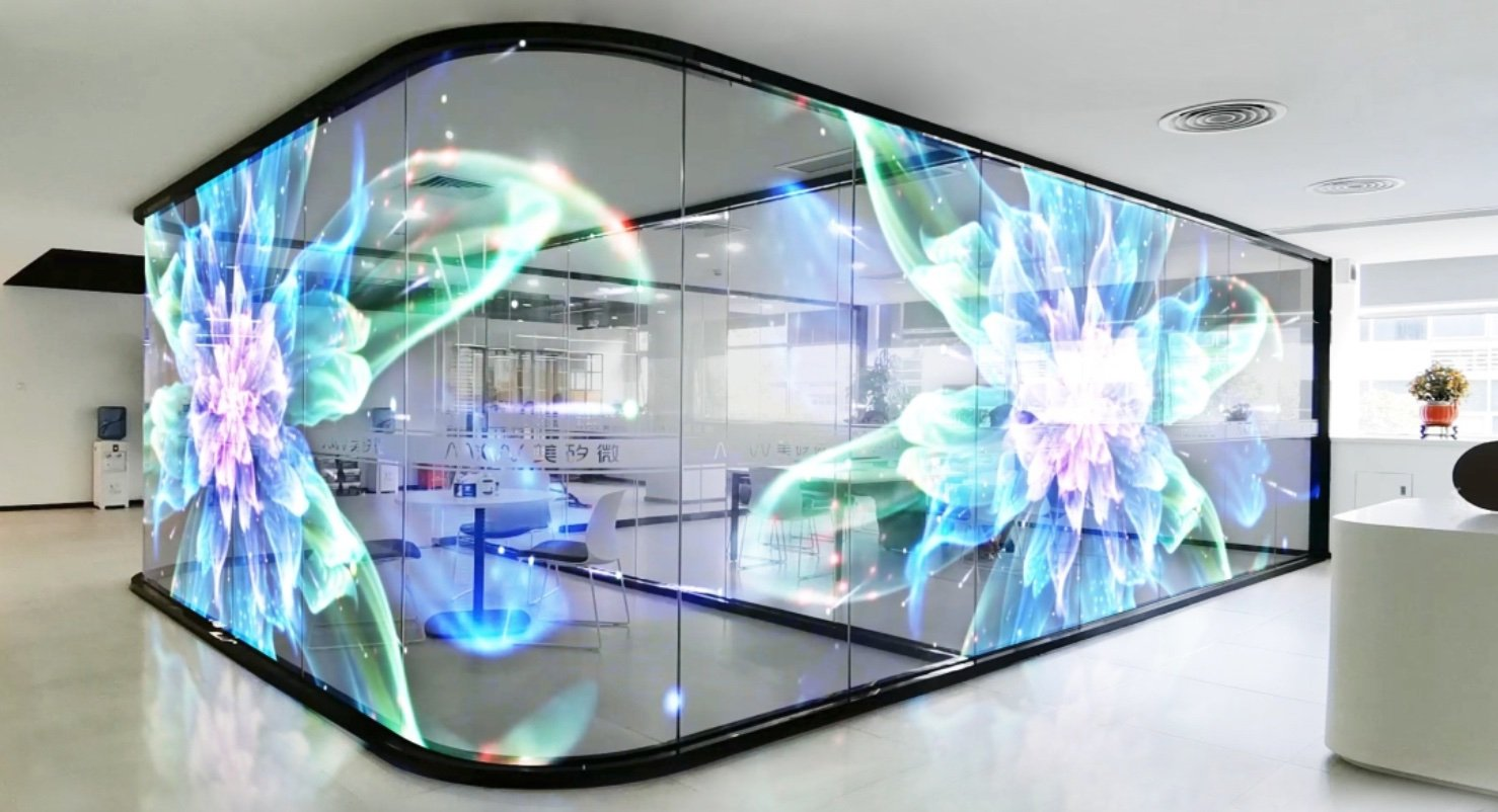 Transparent OLED panel layered over a physical product
