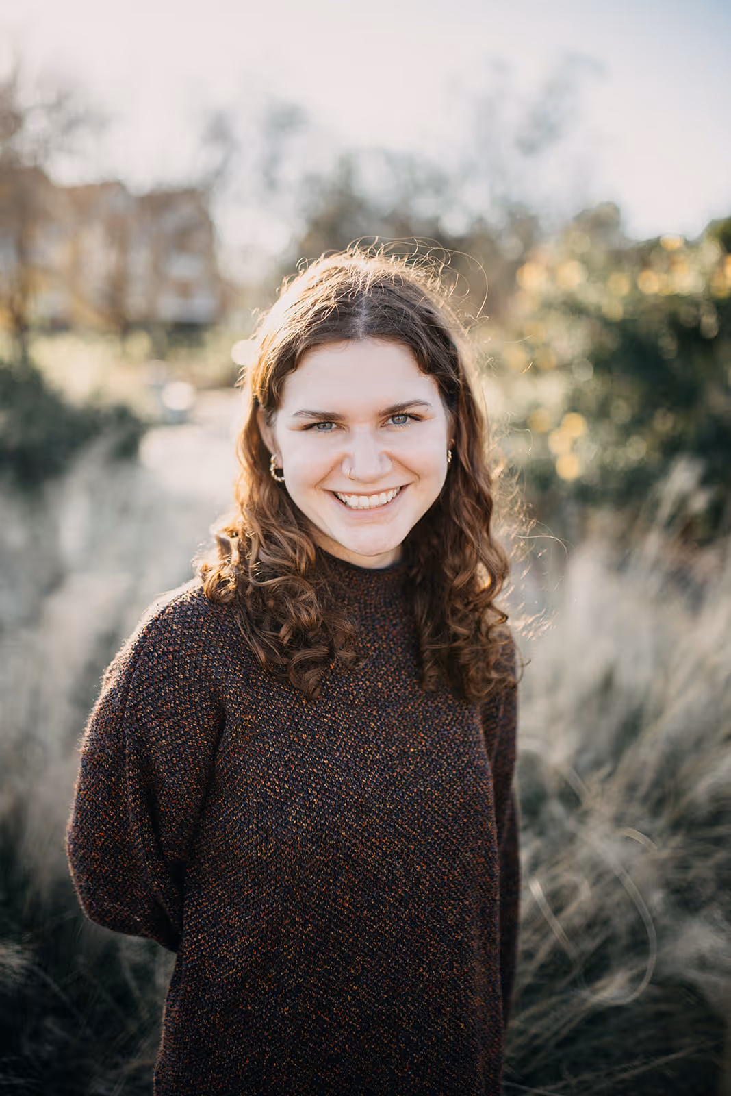 a woman smiling at camera