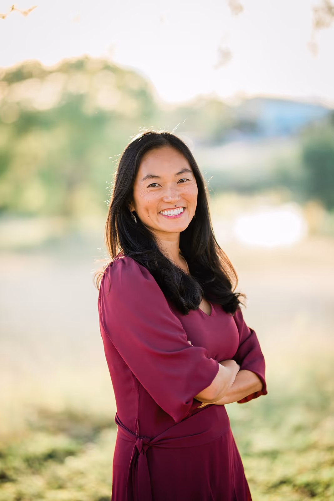 a woman with her arms crossed
