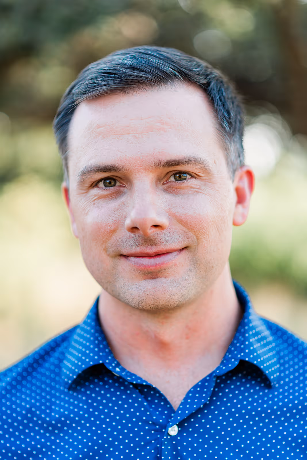 a man in a blue shirt